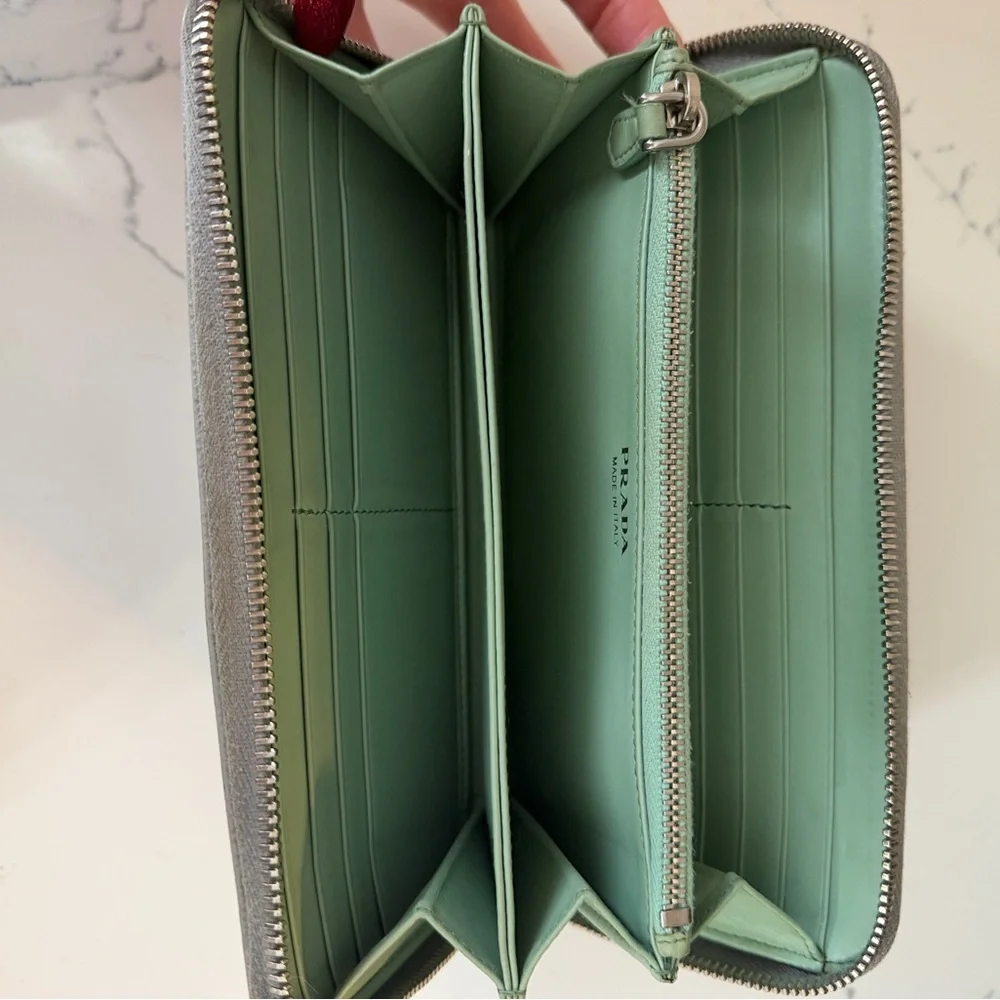 Authentic Prada Gray Leather wallet with mint interior